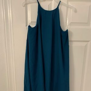 High neck, teal blue dress.